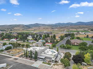 Aerial view of residential area featuring mountains