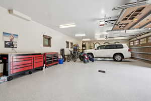 Heated radiant three car garage with epoxy floors