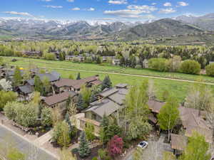 Aerial view of residential area featuring mountains