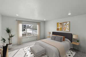 Bedroom with carpet floors, recessed lighting, and baseboards