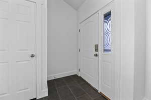 Foyer with baseboards