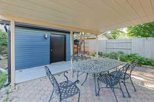 View of patio featuring outdoor dining area