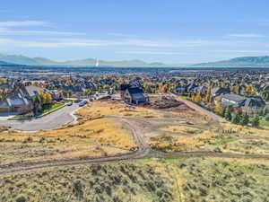 Aerial perspective of suburban area with a mountain backdrop