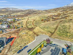 Aerial perspective of suburban area featuring mountains