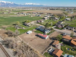 View of property location with a mountain backdrop and nearby suburban area