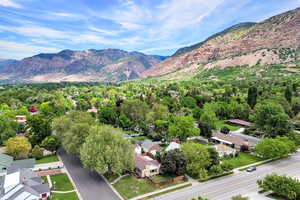 View of mountain background featuring nearby suburban area