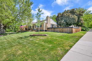 View of yard featuring a wooden deck
