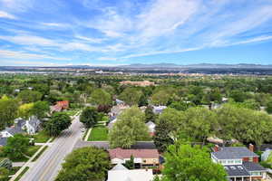 Aerial view of residential area featuring a mountain backdrop