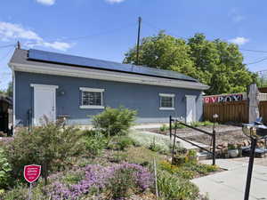 Garage is actually two garages, with solar panels above