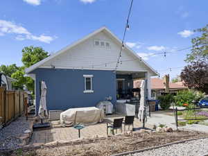 Rear view of house featuring patio