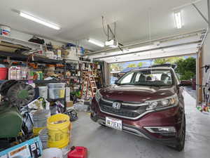 There are TWO garages, one for each unit which you get to from 1000 east and 255 South (easement)