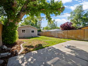 View of yard with a patio area