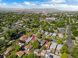 View of property location with mountains and nearby suburban area