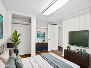 Bedroom featuring wood finished floors
