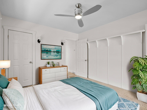 Bedroom featuring a ceiling fan