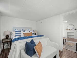 Bedroom with wood finished floors