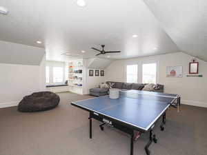 Game room featuring carpet, lofted ceiling, a ceiling fan, recessed lighting, and baseboards