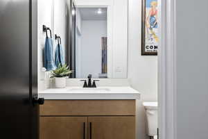 Bathroom featuring toilet and vanity