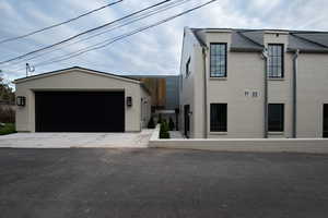North Side view of home with garage