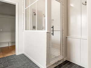 Primary Bathroom Shower and walk-in closet