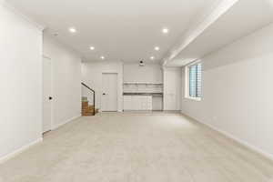 Family Room with vaulted ceilings and wet bar.