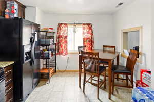 Dining area featuring baseboards
