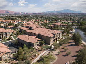 Aerial view of residential area with a mountainous background