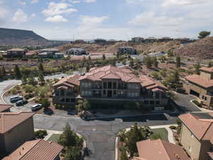 Aerial perspective of suburban area with a mountain backdrop