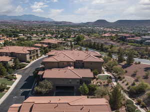 Aerial perspective of suburban area featuring mountains