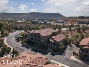 Aerial view of residential area with a mountainous background