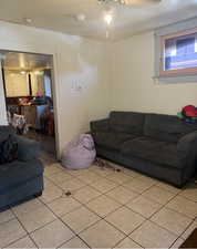 Living room featuring light tile patterned flooring