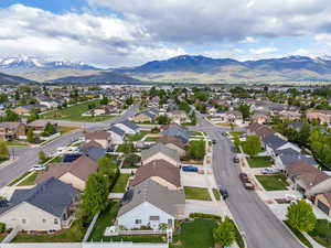 Aerial view of residential area with a mountain backdrop