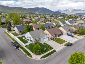 Aerial perspective of suburban area featuring mountains
