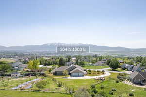 Mountain view featuring nearby suburban area