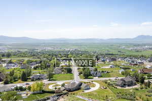 Aerial view of residential area with a mountain backdrop