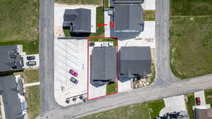 Aerial perspective of suburban area with property boundaries highlighted