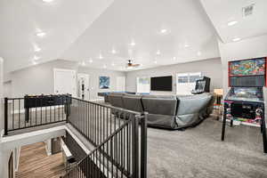 Living room featuring recessed lighting and ceiling fan