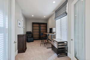 Home office with carpet, recessed lighting, and baseboards