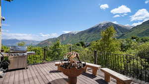 Deck featuring grilling area and a mountain view