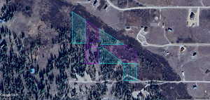 Aerial overview of property's location featuring property boundaries highlighted