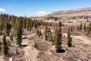View of mountain backdrop featuring rural landscape