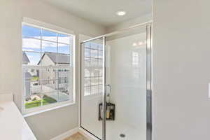 Full bath featuring a stall shower