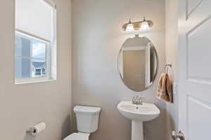 Bathroom featuring toilet and a sink