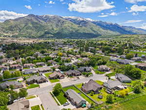 Aerial view of residential area with a mountainous background