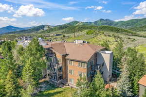 View of subject property featuring a mountain backdrop
