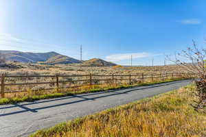 View of asphalt road with a mountain view