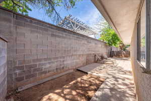 BONUS: Tall block wall. Privacy plus! Room for grass and a sandbox on the opposite end, should you like.