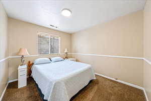 Bedroom 2 features additional lighting for enhanced brightness and comfort.