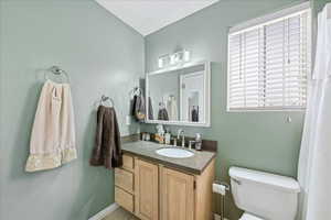 Updated second bath with new paint, updated Quartz countertops, and modern light fixtures for a clean, contemporary feel.