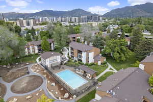 Bird's eye view of a mountainous background and a pool